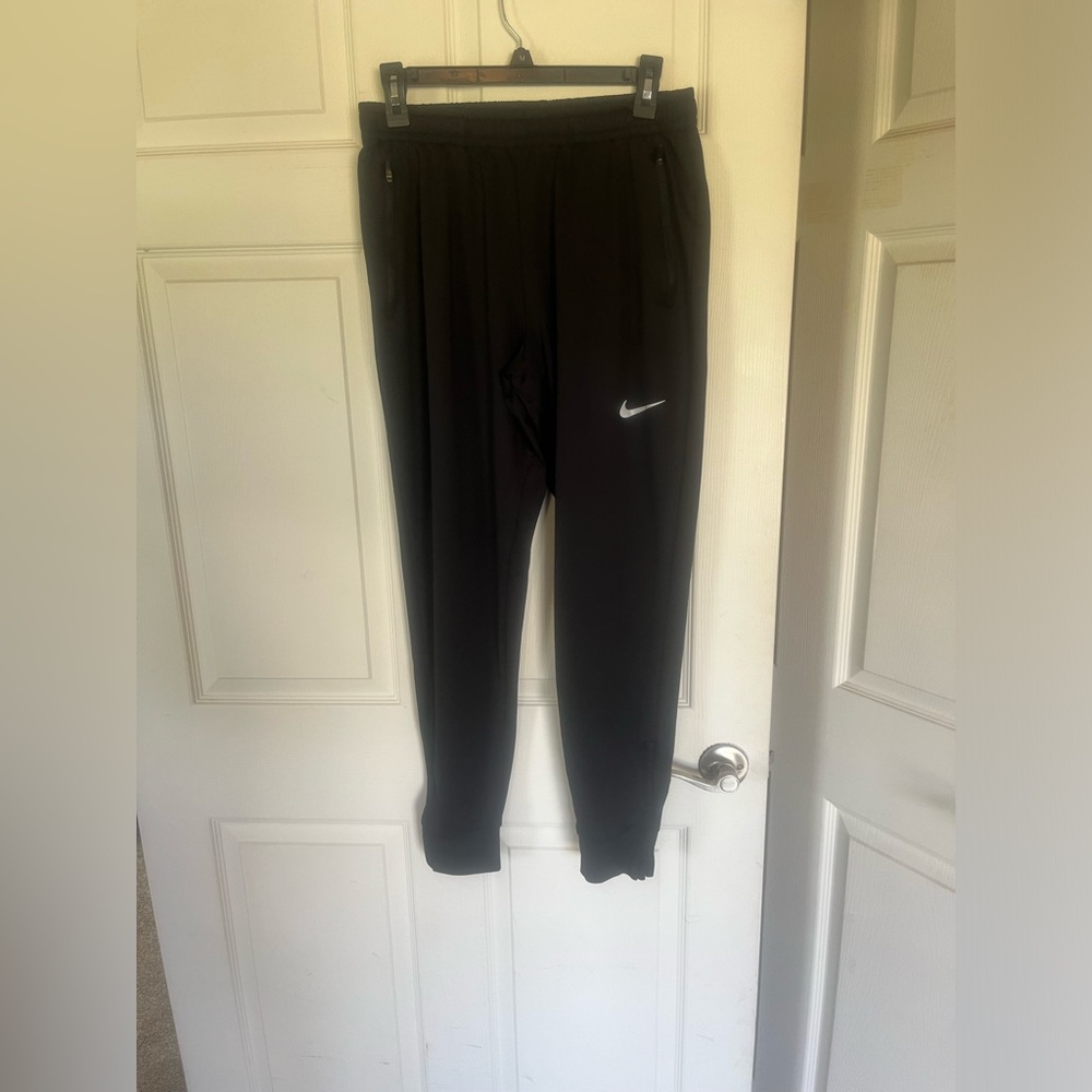 Nike DRI-FIT black track pants size Men’s M